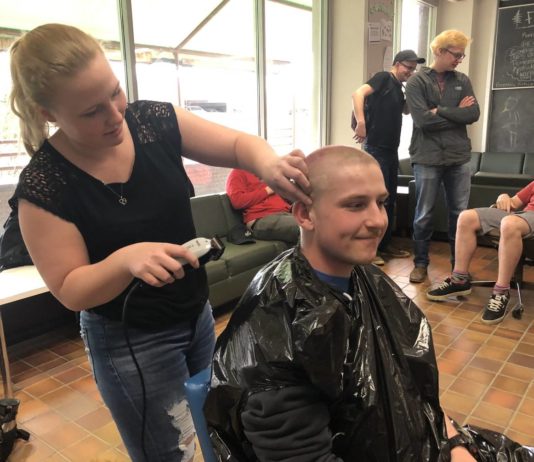 Buzz cut brothers raise $10K for cancer research