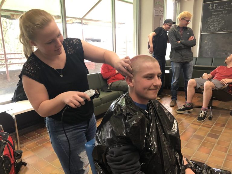 Buzz cut brothers raise $10K for cancer research