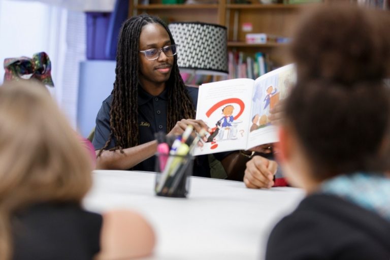 Fraternity provides positive male role models through reading