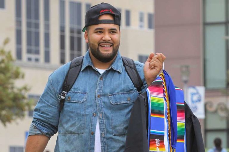 Once a homeless teen dad,  fraternity founder graduates