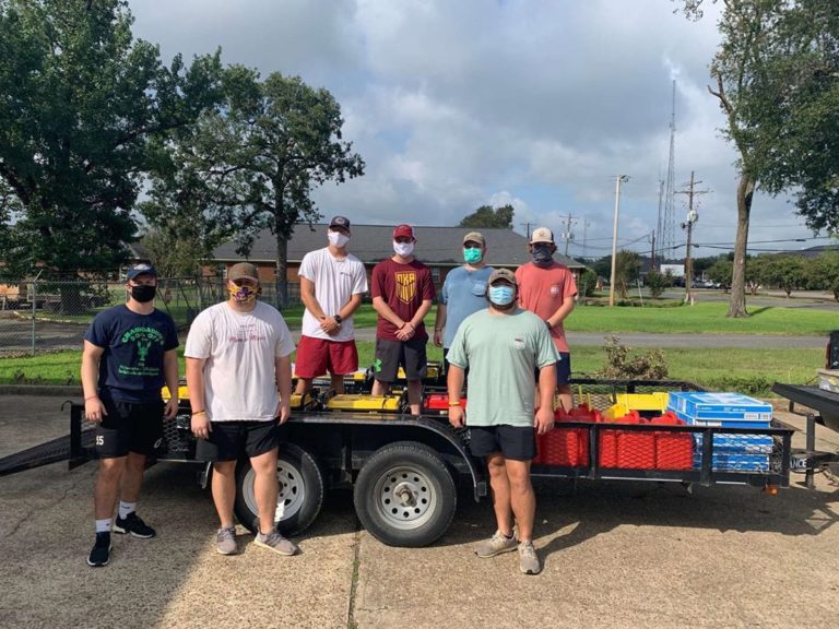 Volunteers clean yards after hurricane