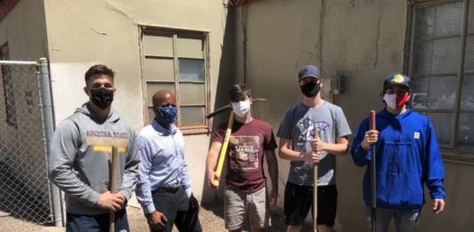 ASU ‘FIJI’ frat members take time to lend helping hand to Salvation Army