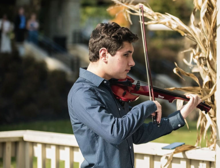 Electric Violinist Strikes a Chord with Fraternity, Professors and Fellow Students