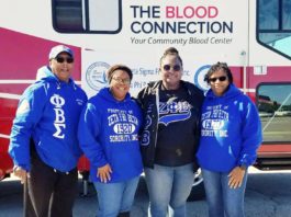 Phi Beta Sigma fraternity and zeta phi beta sorority members at blood drive.