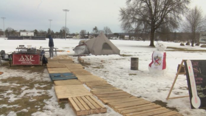 Alpha Chi Rho fraternity members camp out to raise money for cancer research.