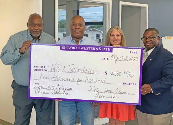 Alumni brothers of Phi Beta Sigma Fraternity, Inc. present a check of $10,500 to the NSU Foundation.