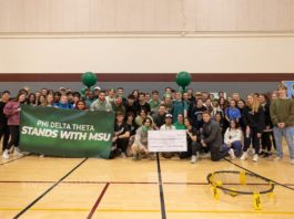 Group photo of all attendees at Phi Delta Theta's Celebration of Life event for Brian Fraser in the Sun Devil Fitness Complex in Tempe.