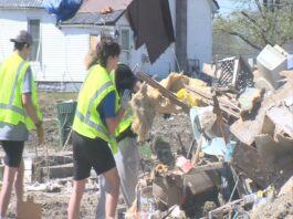 Sigma Alpha Epsilon fraternity members clean up after tornado ravaged Sullivan, Ind.