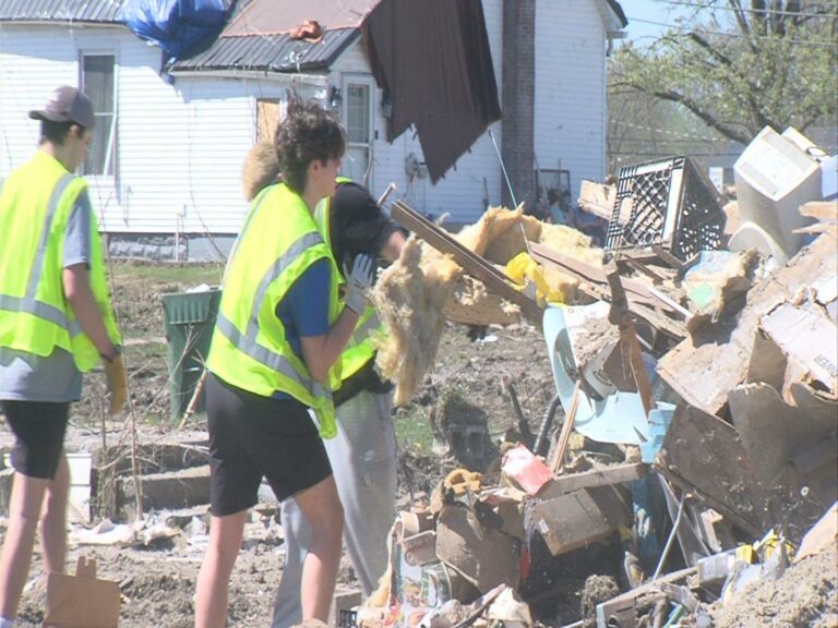 Sigma Alpha Epsilon fraternity members clean up after tornado ravaged Sullivan, Ind.