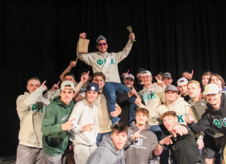 Mr. Fraternity winner and his fraternity brothers. Photo by Erica Ledford