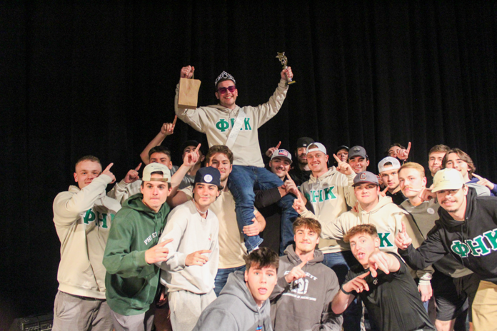 Mr. Fraternity winner and his fraternity brothers. Photo by Erica Ledford