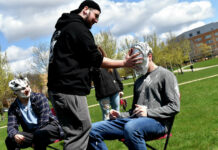 Lambda Chi Alpha members Sam Belanger (right) and Curt Sutherland (left) were among the fraternity brothers to get pied as part of a fundraiser raising money for their fraternity. Trevor Teeple (standing) was among the pie throwers Tuesday. The Lambda Chi Alpha fundraiser ran from 11 a.m. to 4 p.m. and will run again from 11 p.m. to 4 p.m. Wednesday at Ferris State University's Robinson Quad. 1 of 3 Lambda Chi Alpha members Sam Belanger (right) and Curt Sutherland (left) were among the fraternity brothers to get pied as part of a fundraiser raising money for their fraternity. Trevor Teeple (standing) was among the pie throwers Tuesday. Photo by Brendan Sanders/Big Rapids Pioneer.