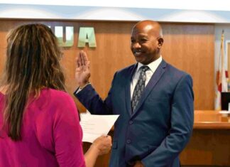 Reginald Hardee was sworn in last week for a third term on the KUA Board of Directors. PHOTO/KUA