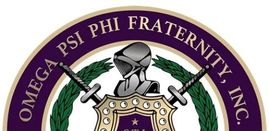 Omega Psi Phi crest logo.