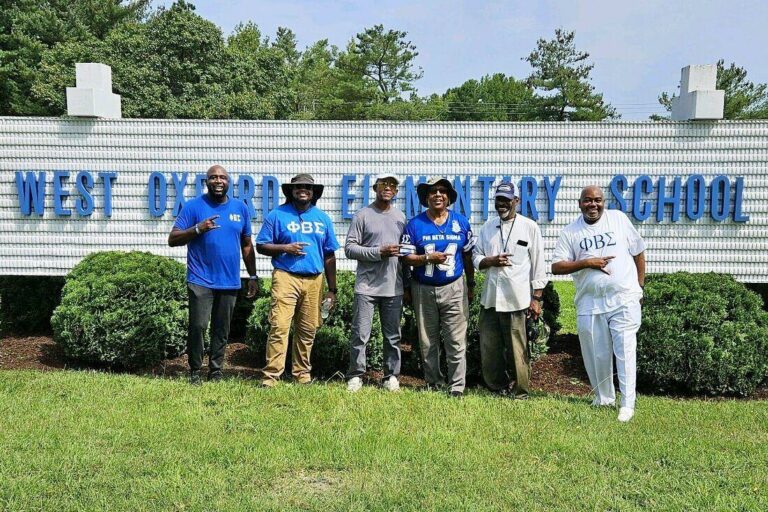 Sigma brothers help spruce up school