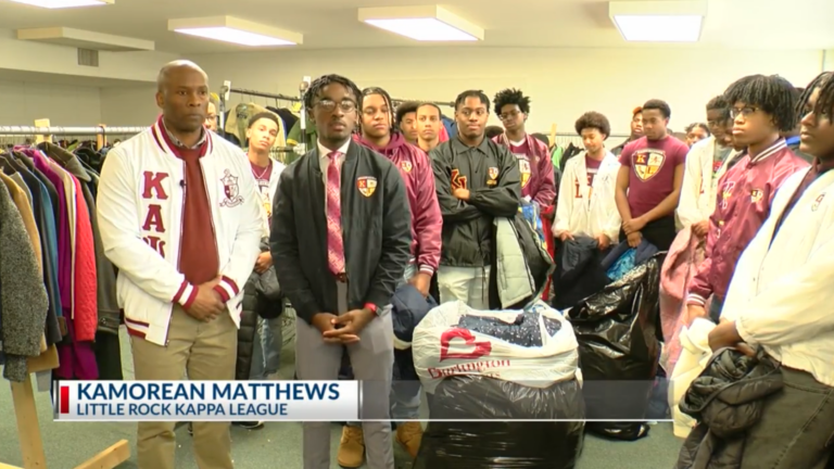Little Rock fraternity alumni deliver coats to The Watershed