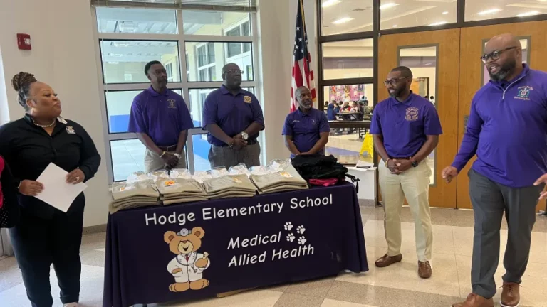 Members of Omega Psi Phi Fraternity, Incorporated give back to local schools