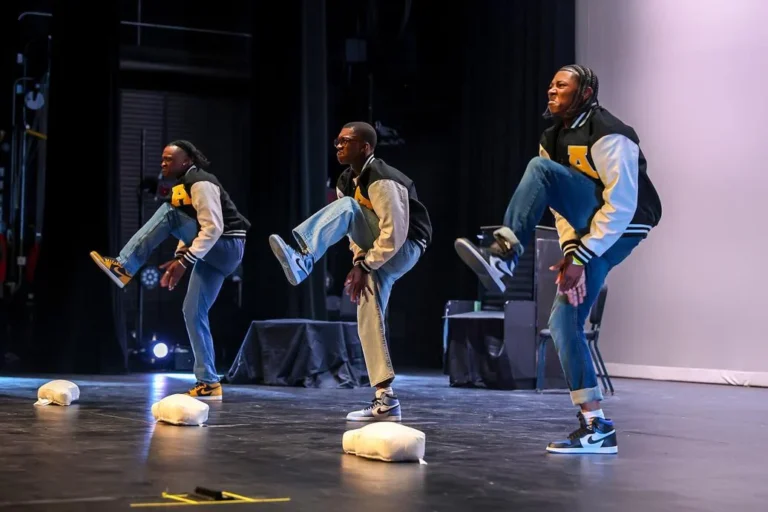 Alpha Phi Alpha reps their fraternity chapter during the National Pan-Hellenic Council (NPHC) 2024 Step Show: Haunted Homecoming
