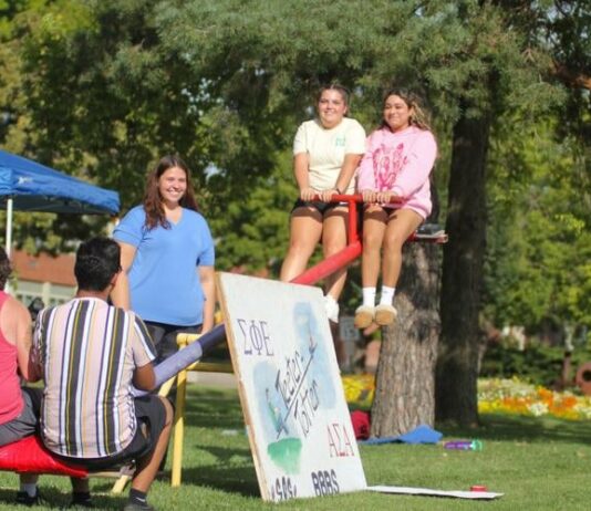 Sigma Phi Epsilon and Alpha Sigma Alpa teeter totter with purpose