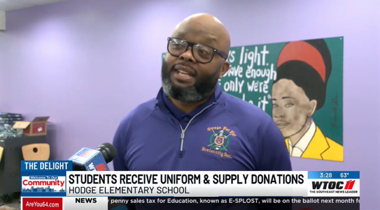 Fraternity donates school supplies to Hodge Elementary School