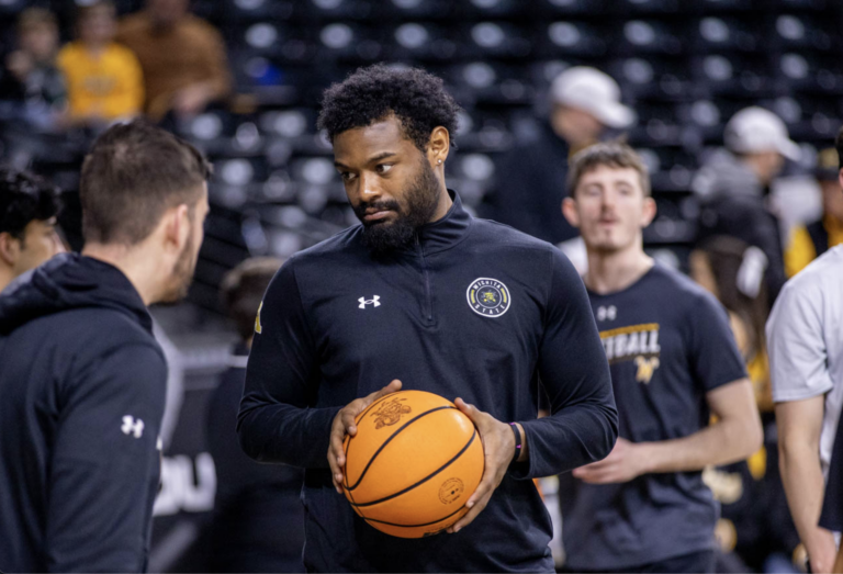 Meet the unsung student managers who keep the men’s basketball team going