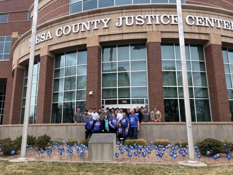CASA, Theta Xi plant pinwheels for Child Abuse Prevention Month