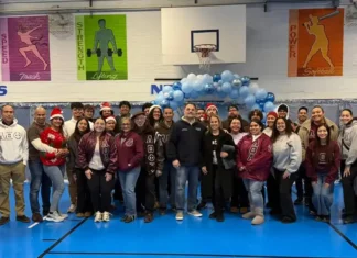 Paterson officers and Lambda fraternity spread holiday cheer at annual Christmas event
