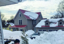 Tau Kappa Epsilon members help community with shoveling after blizzard