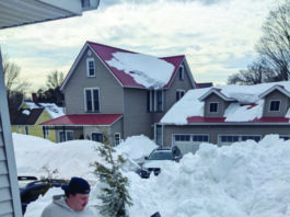 Tau Kappa Epsilon members help community with shoveling after blizzard