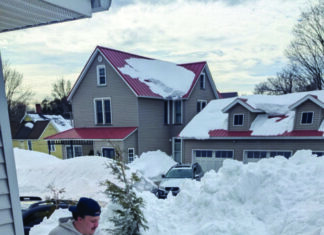 Tau Kappa Epsilon members help community with shoveling after blizzard